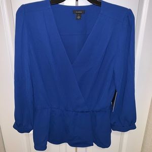 Blue peplum style shirt